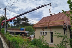 réfection d'une toiture approvisionnement camion grue